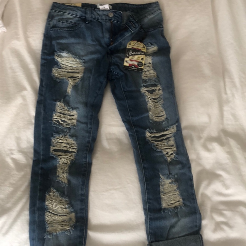 Distressed denim jeans